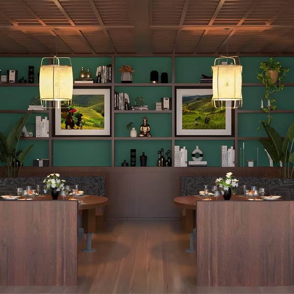 Restaurant interior with two circular booths, wooden tables, green shelving, and rice paddy murals.
